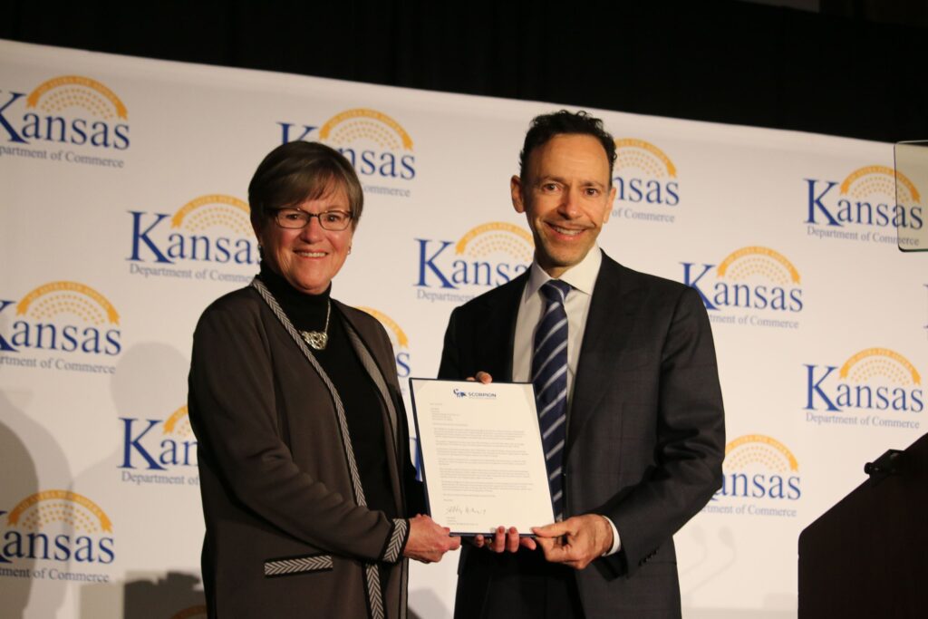 Governor Laura Kelly presents award